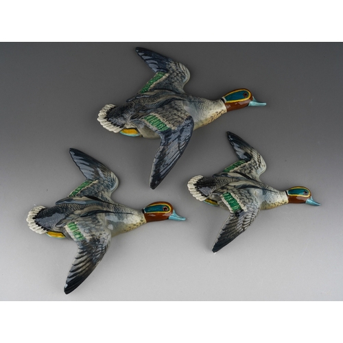 61 - A graduated set of three Beswick Teal wall plaques, comprising model nos 1530-1, 1530-2, 1530-3, pri... 