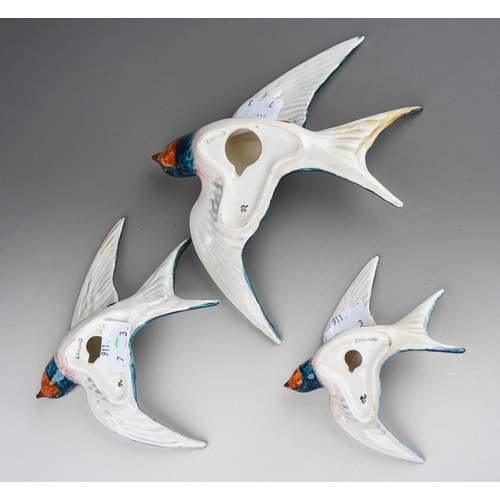 64 - A graduated set of three Beswick Swallow wall plaques, model nos 757-1, 757-2 and 757-3, printed and... 