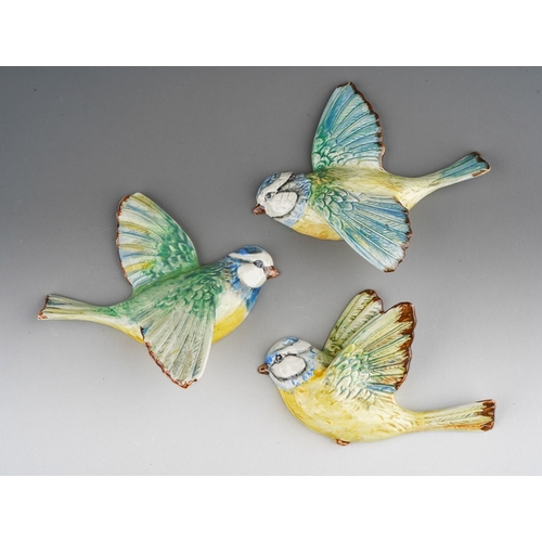 66 - Three Beswick flying Blue Tit wall plaques, model nos 705, 706 and 707, wingspan of largest 12cm, pr... 