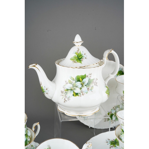 82 - A Royal Albert Trillum pattern part tea set to include: teapot, 9 tea cups, 12 side plates, 8 lunch ... 