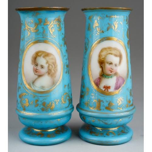 129 - A pair of Victorian cased glass vases of footed baluster form, the turquoise and gilt ground painted... 