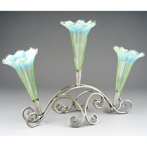 134 - An early 20th Century silver plated wire work Epergne\stand complete with three green vaseline glass... 