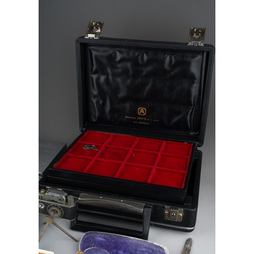 228 - A mixed lot of collectors items, including an Italian Abafil coin case with trays, with key, a chrom... 