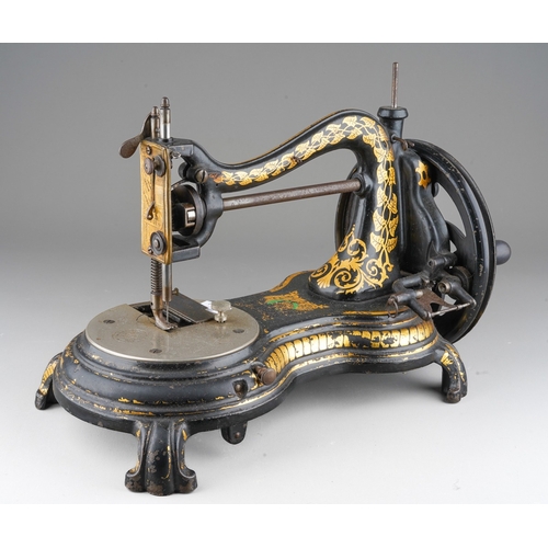 239 - A Victorian cast iron Jones swan neck table top manual sewing machine, figure of eight shaped base, ... 