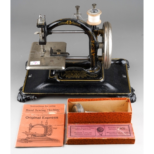 240 - A late Victorian cast iron table top manual sewing machine of Original Express shape but unmarked, g... 