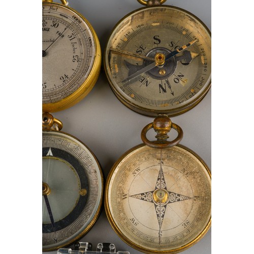 243 - A group of 19th Century and early 20th Century brass and gilt metal cased compasses including a Anco... 