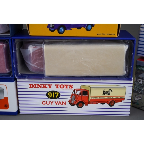 267 - Six Atlas reproduction Dinky toy vans (numbers 514, 917, 434, 512, 412)