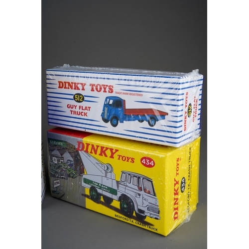 267 - Six Atlas reproduction Dinky toy vans (numbers 514, 917, 434, 512, 412)