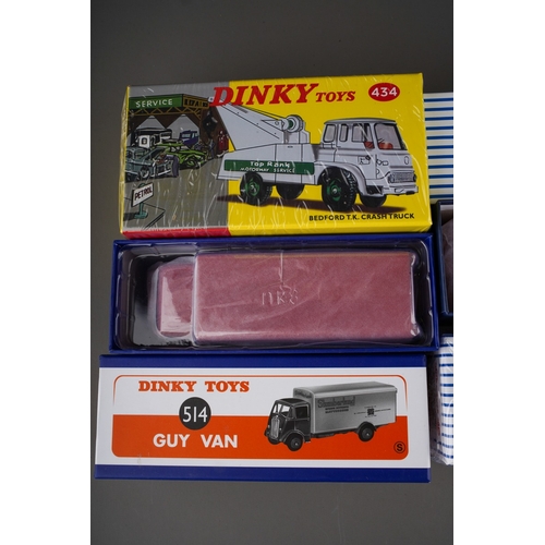 267 - Six Atlas reproduction Dinky toy vans (numbers 514, 917, 434, 512, 412)