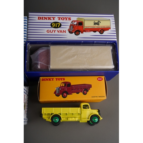 267 - Six Atlas reproduction Dinky toy vans (numbers 514, 917, 434, 512, 412)