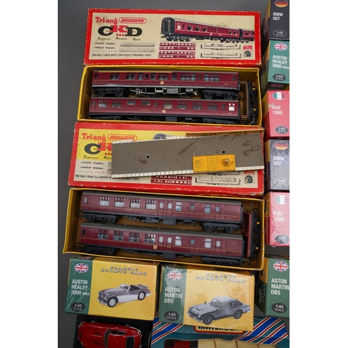 273 - Collection of toys and trains to include loose mainly Tri-Ang trains, tracks, accessories, boxed Tri... 