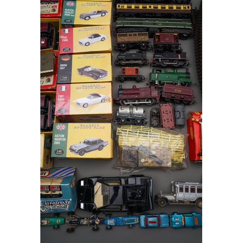 273 - Collection of toys and trains to include loose mainly Tri-Ang trains, tracks, accessories, boxed Tri... 