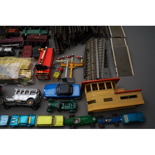 273 - Collection of toys and trains to include loose mainly Tri-Ang trains, tracks, accessories, boxed Tri... 