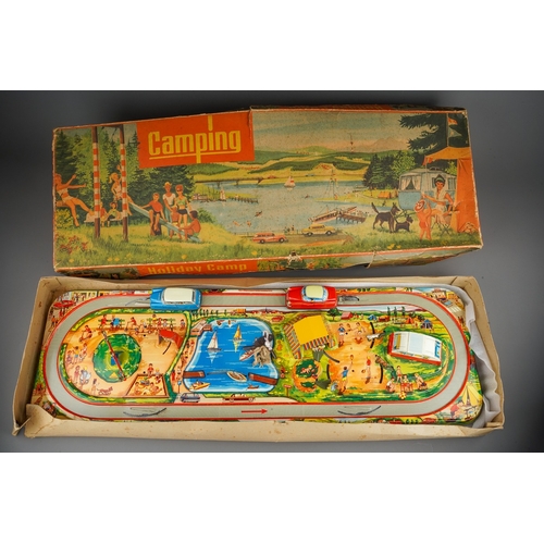 283 - Boxed vintage Technofix tinplate clockwork Holiday Camp (damage to the box)