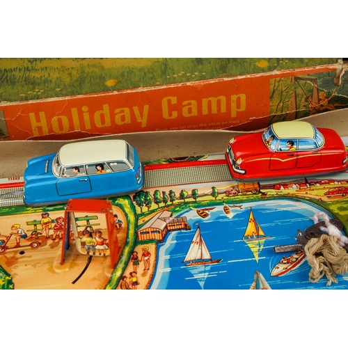 283 - Boxed vintage Technofix tinplate clockwork Holiday Camp (damage to the box)