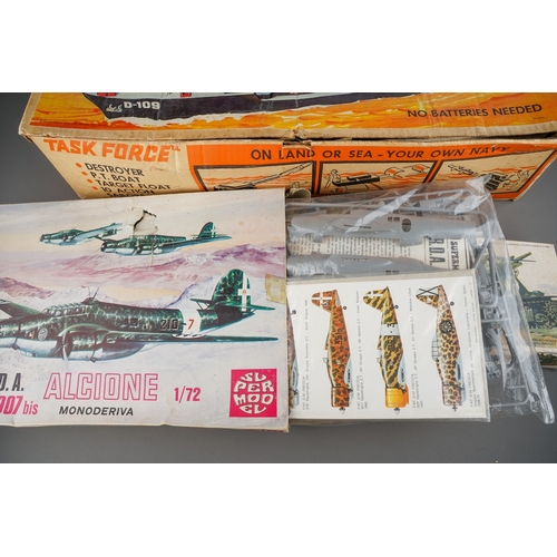 284 - Vintage military toys to include: boxed Task Force by Deluxe 1964 (destroyer, PT Boat, figures - unc... 