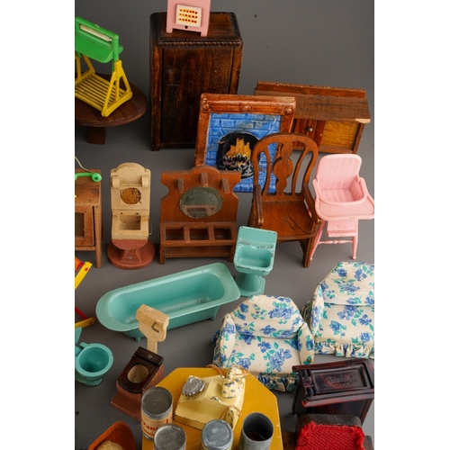 285 - A collection of assorted dolls house furniture and accessories, including a small quantity of fabric... 