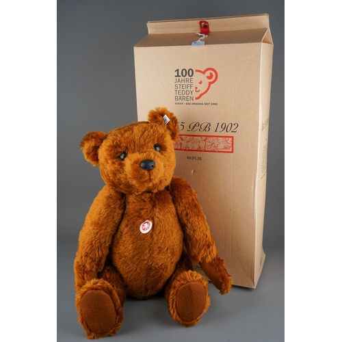 288 - A Steiff 1902 Replica brown Teddy Bear, 55cm long, button and white tag no: 02520 with certificate, ... 