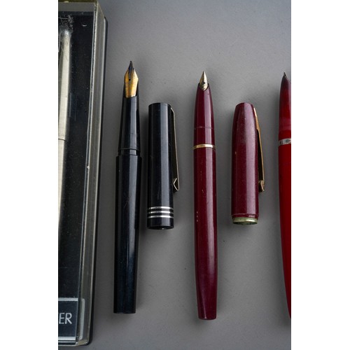 442 - A collection of pens to include three various Parker fountain pens, one boxed; a Sheaffer`s fountain... 