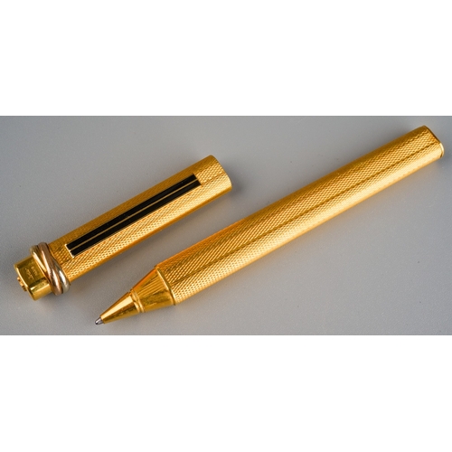 444 - A gold-plated Must de Cartier Vendome Trinity oval ballpoint pen, length approx 13cm, numbered 20342... 