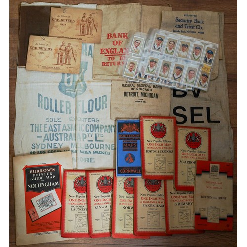 450 - A bag of vintage cloth bank cash and flour bags, a small quantity of cigarette cards in albums and l... 