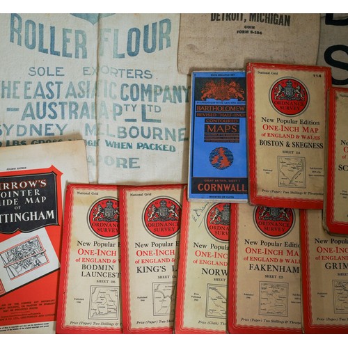 450 - A bag of vintage cloth bank cash and flour bags, a small quantity of cigarette cards in albums and l... 