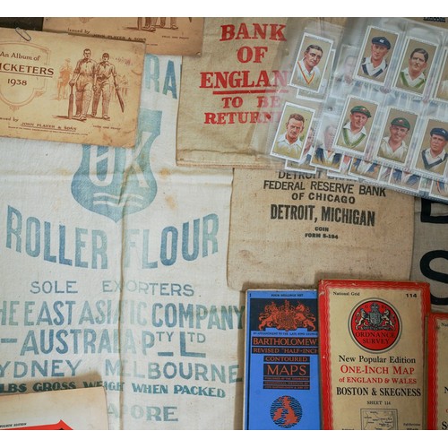 450 - A bag of vintage cloth bank cash and flour bags, a small quantity of cigarette cards in albums and l... 