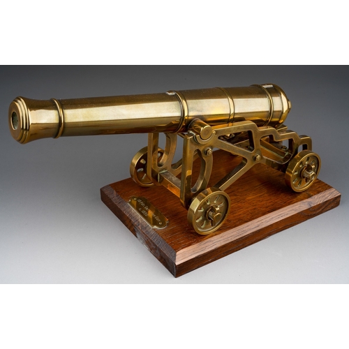 461 - A brass model of a 18 Pdr. Garrison Gun from circa 1850, on oak base