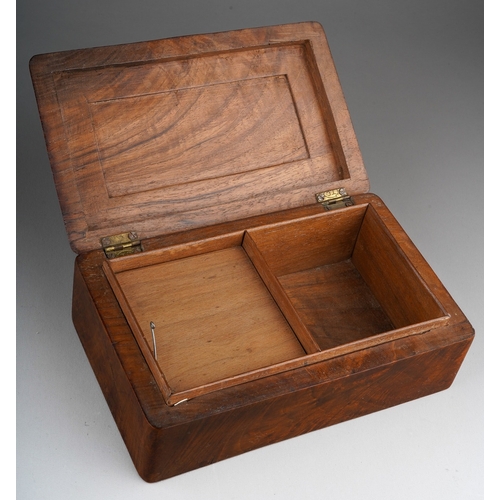 467 - An early 20th century hardwood cigarette box of rectangular form, the hinged rounded lid carved with... 