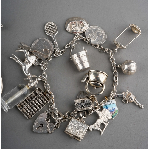 626 - Collection of silver jewellery to include bracelet, brooches, pendants  including reticulated fish e... 