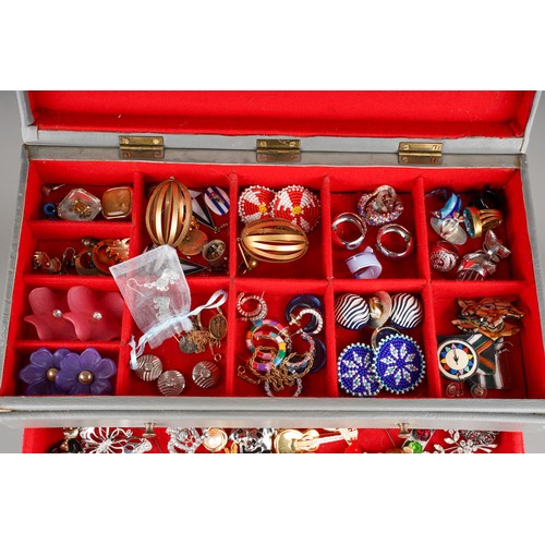 631 - Large collection of costume jewellery in grey set of jewellery draws to include earrings, brooches, ... 