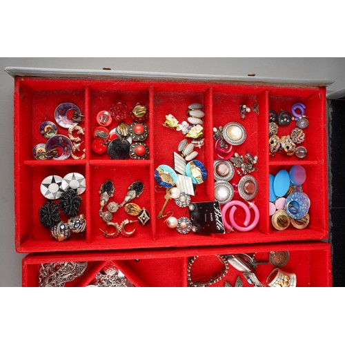 631 - Large collection of costume jewellery in grey set of jewellery draws to include earrings, brooches, ... 