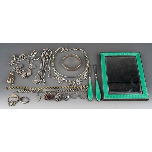 633 - Silver and enamel photo frame together with a collection of silver jewellery to include silver bear ... 