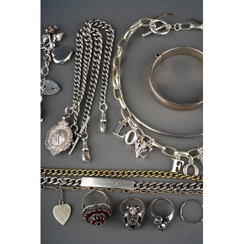 633 - Silver and enamel photo frame together with a collection of silver jewellery to include silver bear ... 