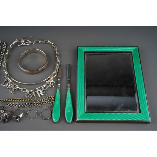 633 - Silver and enamel photo frame together with a collection of silver jewellery to include silver bear ... 