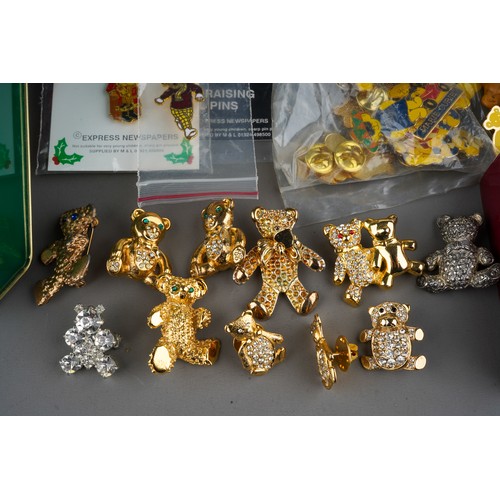 644 - Collection of costume jewellery to include Steiff pendant watch, bear pins and brooches, Rupert badg... 