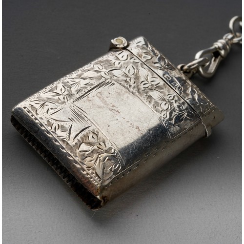 653 - An Edwardian silver engraved vesta case, hallmarked Birmingham, 1907 together with a white metal pro... 