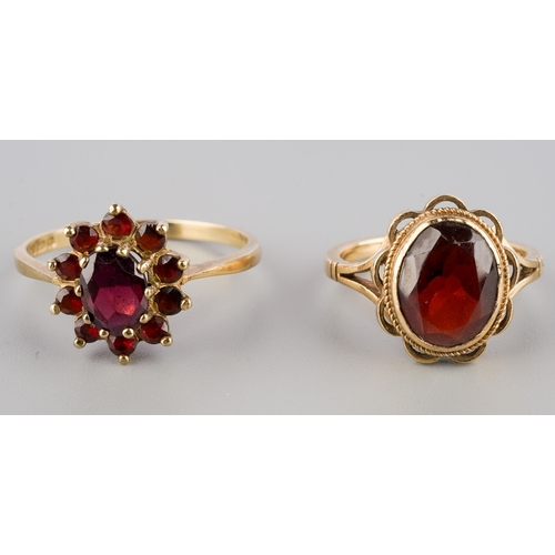 666 - Two yellow metal garnet rings, to include a 9ct gold garnet cluster ring, hallmarked 9ct gold, toget... 