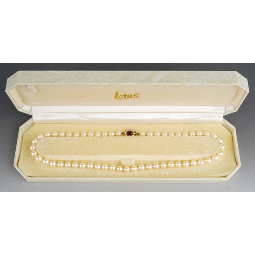 678 - A set of even sized pearl necklace set with 9 ct gold seed pearl and garnet clasp. length folded 23 ... 