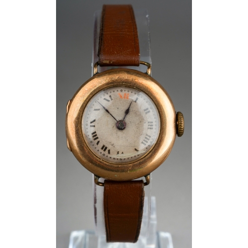 782 - Ladies 9ct watch on a leather strap, gross weight 16.6g