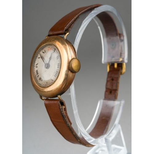 782 - Ladies 9ct watch on a leather strap, gross weight 16.6g