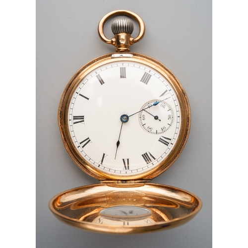 787 - An early 20th century 9ct gold half hunter pocket watch. The white enamel dial with black Roman nume... 