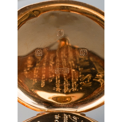 787 - An early 20th century 9ct gold half hunter pocket watch. The white enamel dial with black Roman nume... 