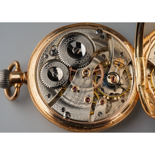 787 - An early 20th century 9ct gold half hunter pocket watch. The white enamel dial with black Roman nume... 