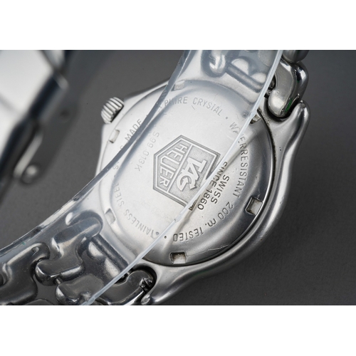 794 - Tag Heuer: A Stainless Steel Calendar Centre Seconds Wristwatch, signed Tag Heuer, Professional 200 ... 