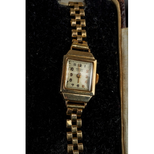 799 - Ladies 9ct watch with a 9ct gold strap in original box, gross weight 13.4g