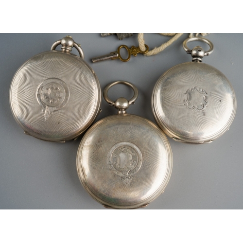 808 - Three silver cased open faced key wind pocket watches, enamel dials with Roman numerals, one stamped... 