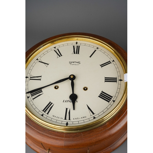 887 - Two Victorian style circular walnut cased wall clocks, Yonge & Son Strand London and Smiths Enfield ... 