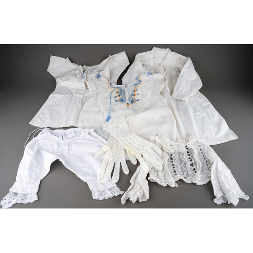 890 - A box containing a collection of vintage childrens costume, mainly cotton and lace, some broiderie a... 