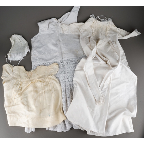 890 - A box containing a collection of vintage childrens costume, mainly cotton and lace, some broiderie a... 